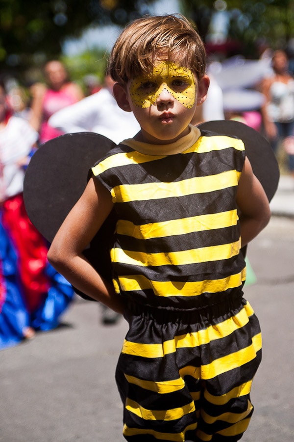 boy dressed as bee at parade in Costa Rica