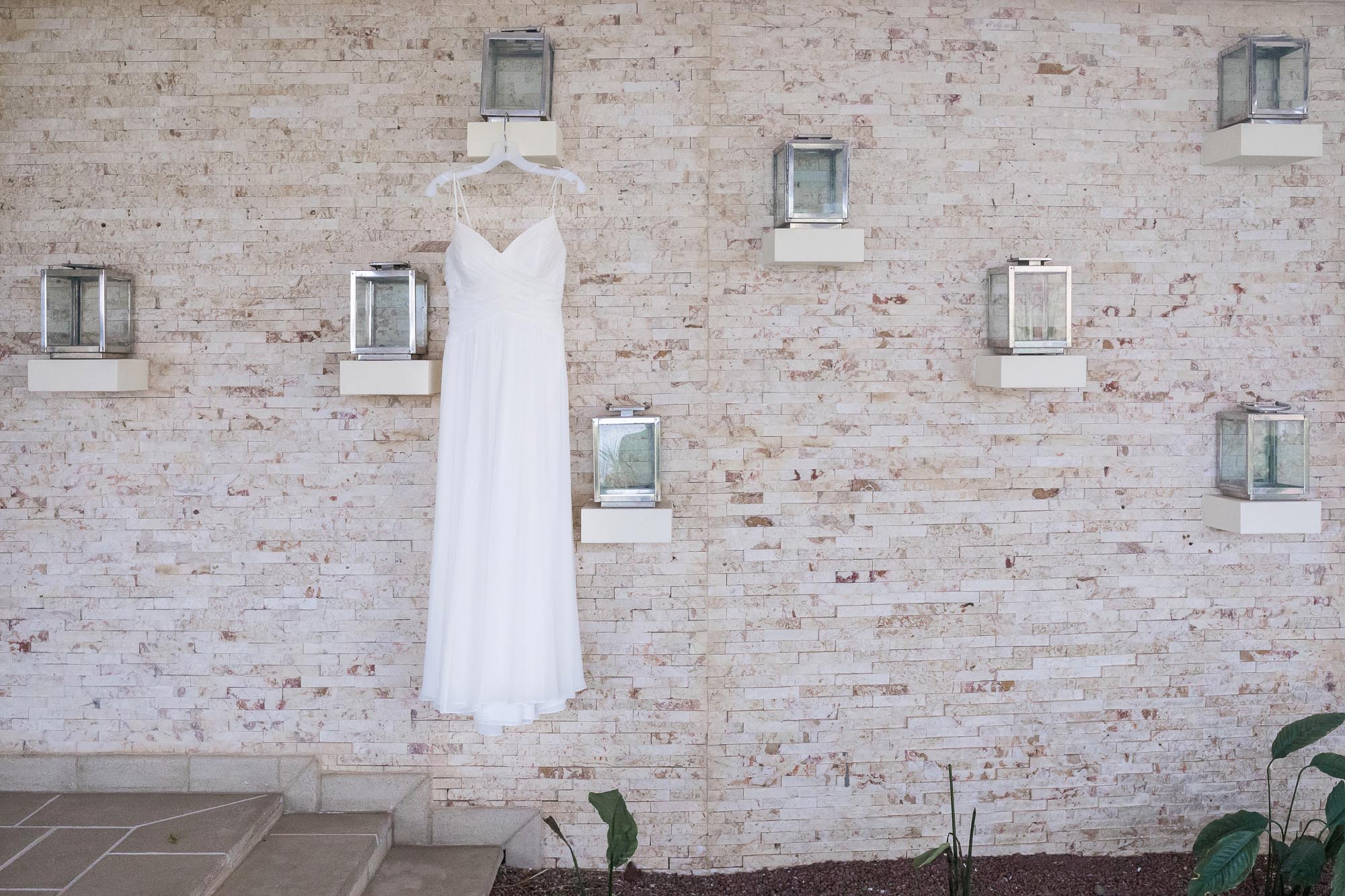 The dress hanging in front of an artistic wall in Villa Paraiso, Tamarindo, Costa Rica