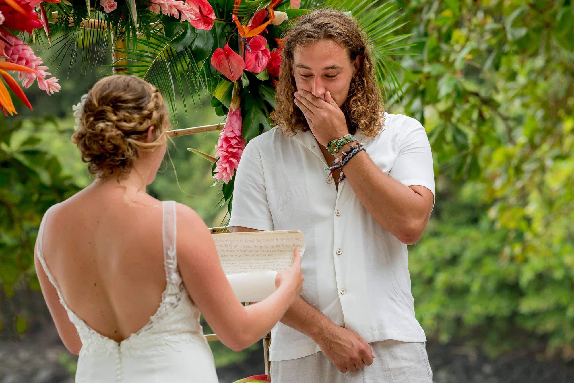 Groom gets a little emotional as the bride reads her vows