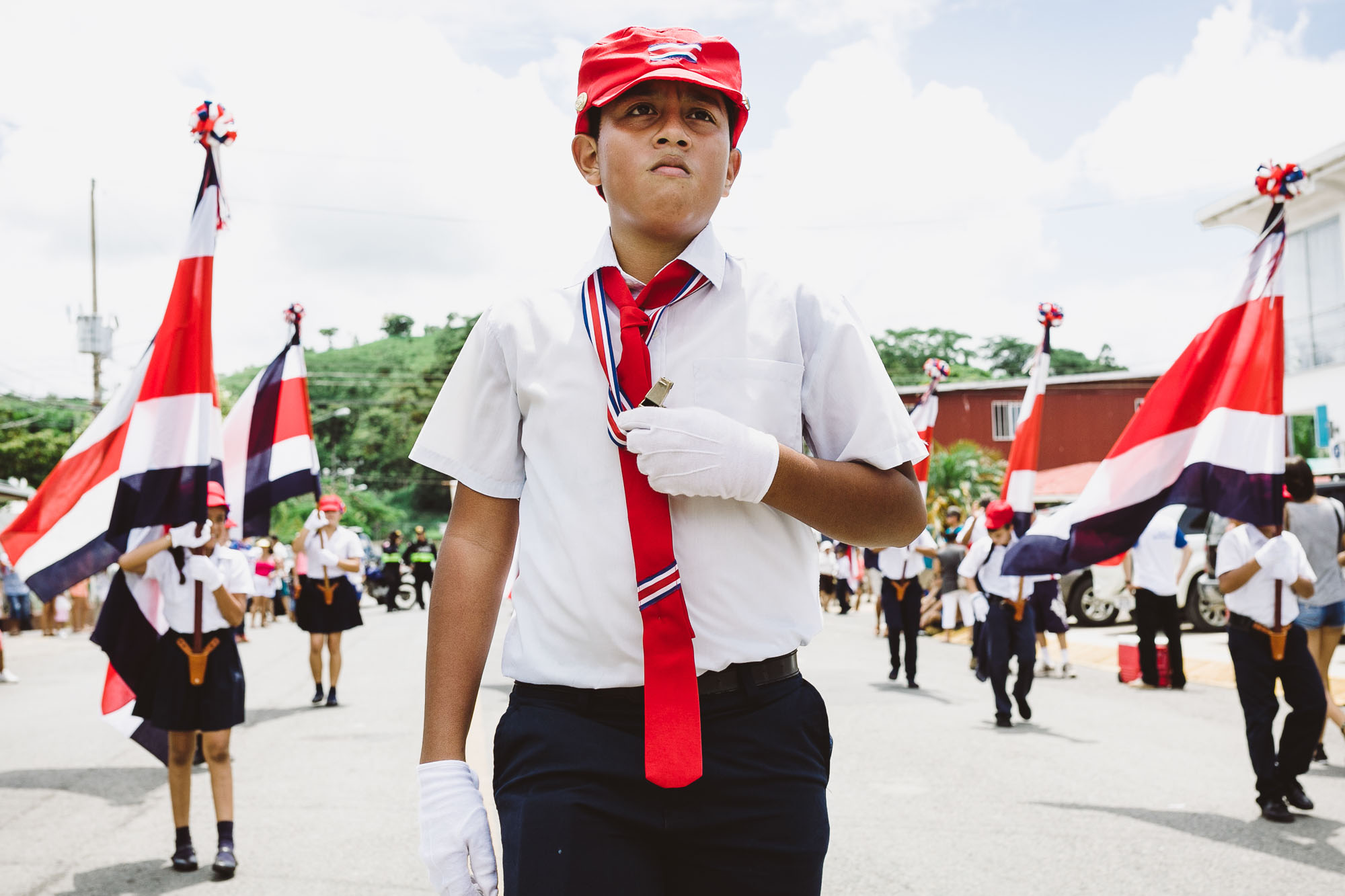 Boy marching in the parade for independence day in Costa Rica