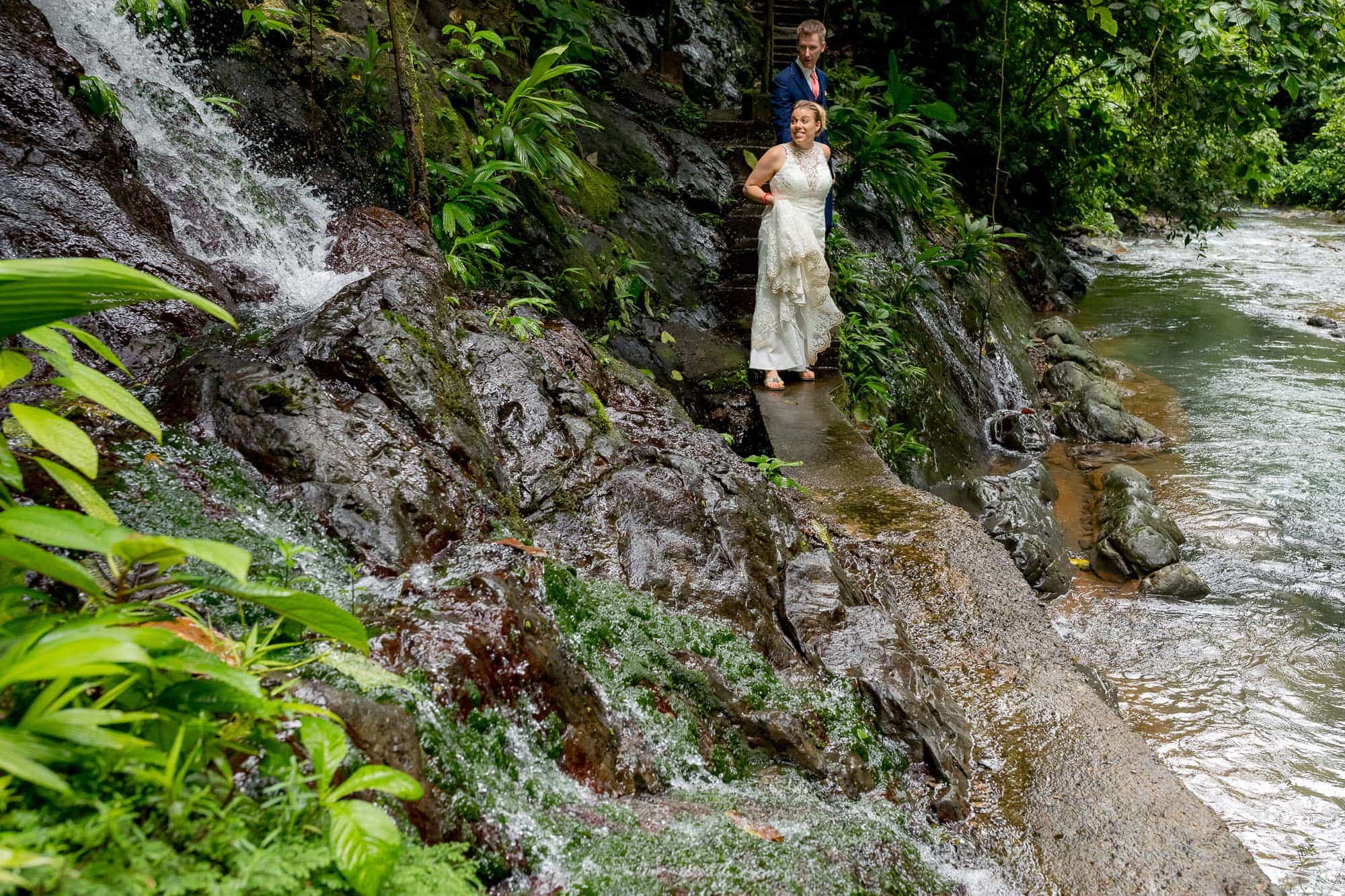 Bride and groom arriving at the waterfall