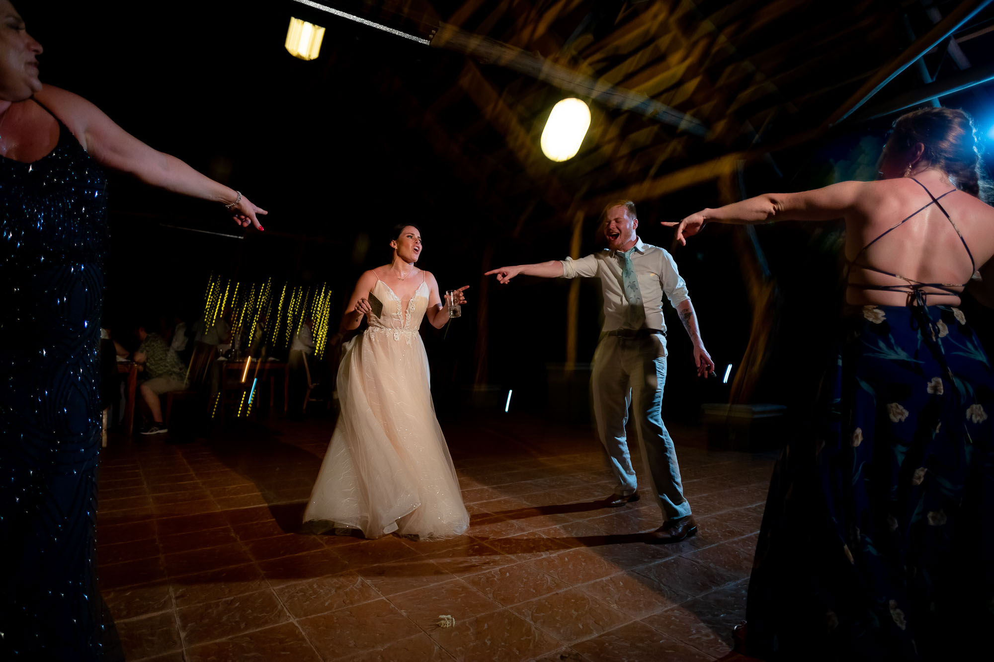 The bride dancing with guests